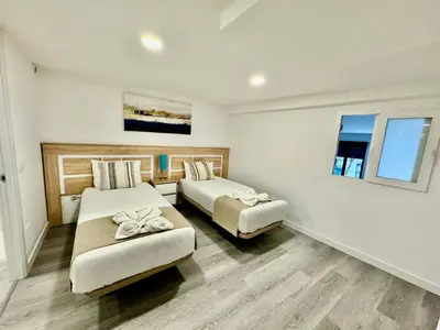 Cama o camas de una habitación en Ave María Five bedrooms Seasonal Living