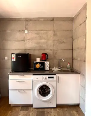 Una cocina o zona de cocina en Meta Habitat Ramon Lujan B
