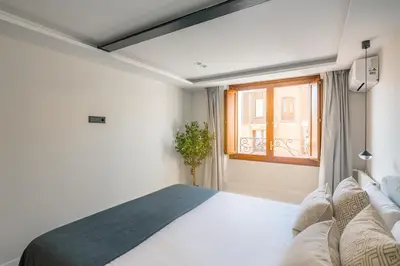 Cama o camas de una habitación en Location, Luxury & Style Best 4Bed in Madrid
