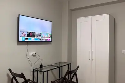Una televisión o centro de entretenimiento en Meta Habitat Ramon Lujan A