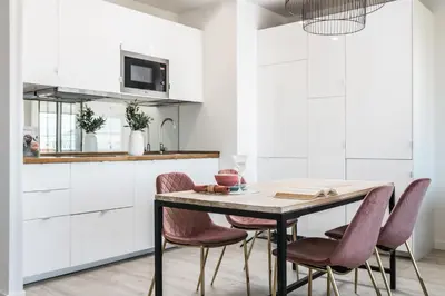 Una cocina o zona de cocina en Homeclub Apartment at Plaza Colon XXIII