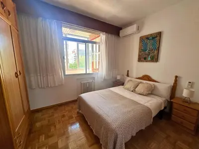 Cama o camas de una habitación en Apartamento Acogedor al lado del Estadio Bernabéu