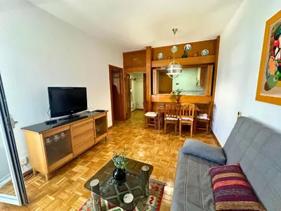 Una televisión o centro de entretenimiento en Apartamento Acogedor al lado del Estadio Bernabéu