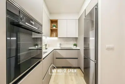 Una cocina o zona de cocina en MyHouseSpain - Nuevo piso reformado en Malasaña