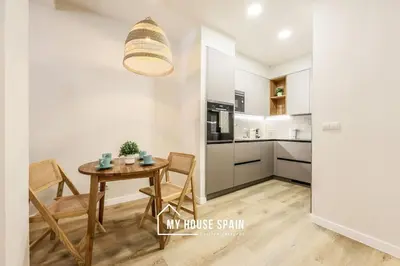 Una cocina o zona de cocina en MyHouseSpain - Nuevo piso reformado en Malasaña