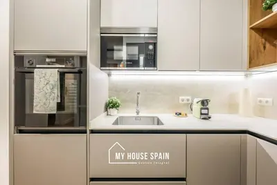 Una cocina o zona de cocina en MyHouseSpain - Nuevo piso reformado en Malasaña