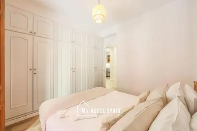 Cama o camas de una habitación en MyHouseSpain - Nuevo piso reformado en Malasaña