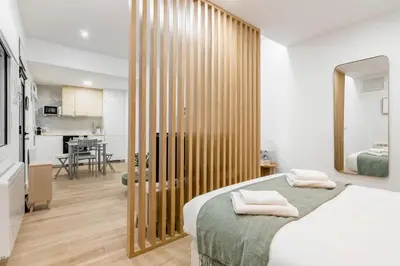 Cama o camas de una habitación en Chueca Center - Estudios en el Centro de Madrid