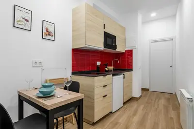 Una cocina o zona de cocina en Chueca Center - Estudios en el Centro de Madrid