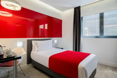 Cama o camas de una habitación en Eurostars Central