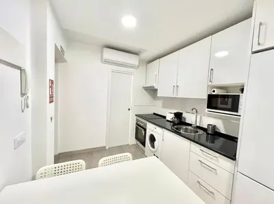 Una cocina o zona de cocina en Metro Avenida de América 09