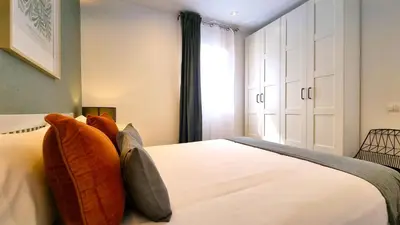 Cama o camas de una habitación en LA MADRILEÑA