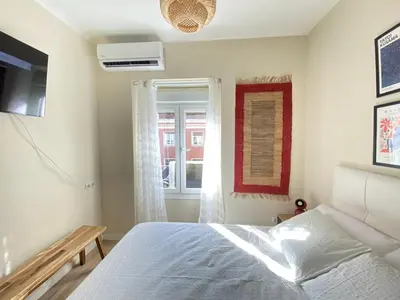 Cama o camas de una habitación en ESTUDIOS GRAN VÍA