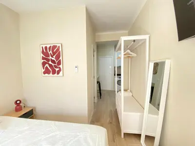 Cama o camas de una habitación en ESTUDIOS GRAN VÍA