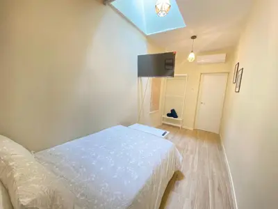 Cama o camas de una habitación en ESTUDIOS GRAN VÍA
