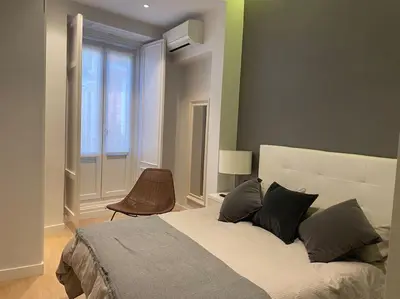 Cama o camas de una habitación en Apto Chueca 1 dormitorio. 2 baños