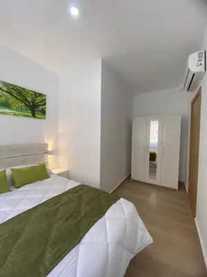 Cama o camas de una habitación en El Jardín del Ángel Romero