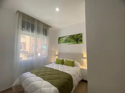 Cama o camas de una habitación en El Jardín del Ángel Romero