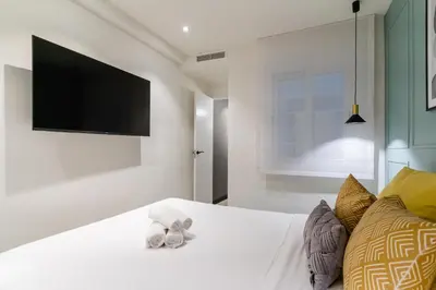 Cama o camas de una habitación en Modern apartment-2Bedrooms 2Baths-Malasaña
