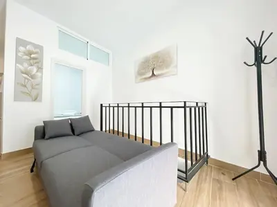 Cama o camas de una habitación en Cerca del centro y luminoso