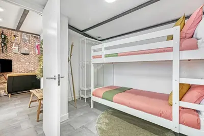 Cama o camas de una habitación en Aesthetic Apt, 15min Gran Vía, Sol, Theme park