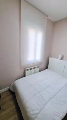 Cama o camas de una habitación en Acogedor apartamento en Atocha by beBalmy