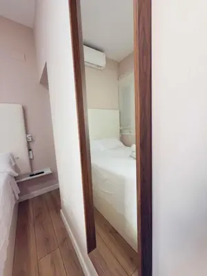 Cama o camas de una habitación en Acogedor apartamento en Atocha by beBalmy