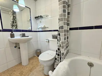 Un baño de Los herradores de San Miguel
