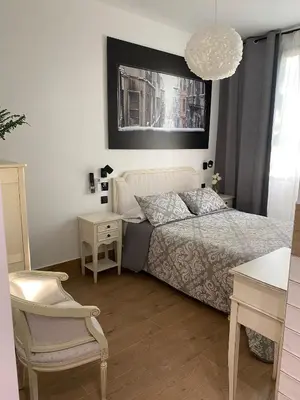 Cama o camas de una habitación en GARDEN HOUSE Madrid