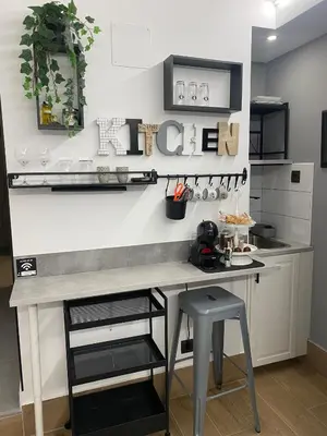 Una cocina o zona de cocina en GARDEN HOUSE Madrid