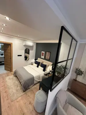 Cama o camas de una habitación en Delicias Esq, calidades de lujo