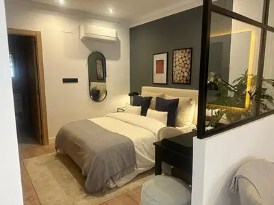 Cama o camas de una habitación en Delicias Esq, calidades de lujo