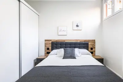 Cama o camas de una habitación en Apartamentos a 5 minutos del centro de Madrid 4P