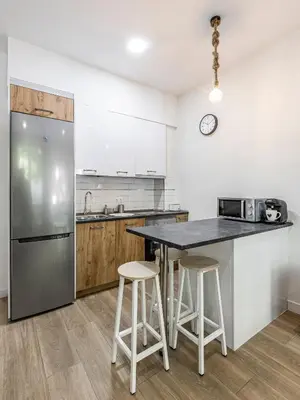 Una cocina o zona de cocina en Apartamentos a 5 minutos del centro de Madrid 4P