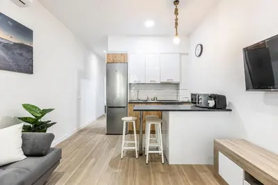 Una cocina o zona de cocina en Apartamentos a 5 minutos del centro de Madrid 4P
