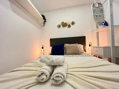Cama o camas de una habitación en Acogedor Ile madrid Baba olivar Temporal
