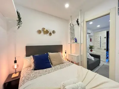 Cama o camas de una habitación en Acogedor Ile madrid Baba olivar Temporal