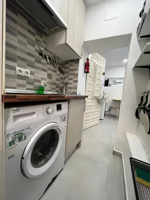 Una cocina o zona de cocina en Acogedor Ile madrid Baba olivar Temporal