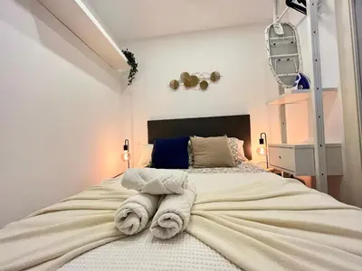 Cama o camas de una habitación en Acogedor Ile madrid Baba olivar Temporal