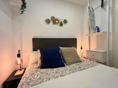 Cama o camas de una habitación en Acogedor Ile madrid Baba olivar Temporal