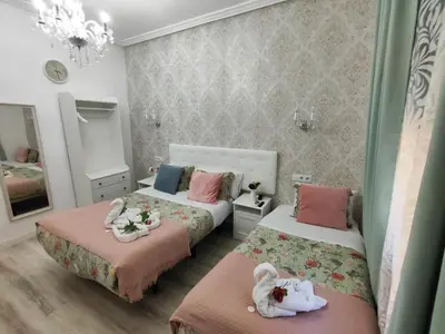 Cama o camas de una habitación en Hostal Milan