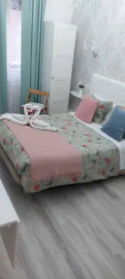 Cama o camas de una habitación en Hostal Milan