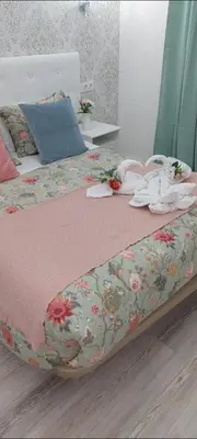 Cama o camas de una habitación en Hostal Milan