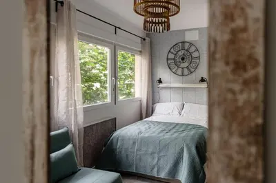 Cama o camas de una habitación en Cozy duplex apartment in Barrio de Salamanca - Heredia