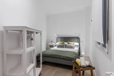 Cama o camas de una habitación en ¡Estilo y luz en Hermosilla!
