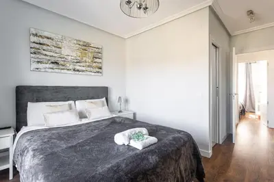 Cama o camas de una habitación en Precioso apartamento con vistas excepcionales - SGN
