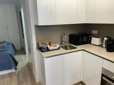 Una cocina o zona de cocina en AZCA-Bernabéu Apartments