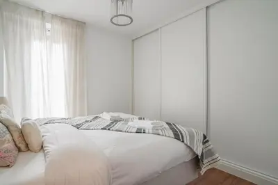 Cama o camas de una habitación en Bright and cozy-2Bedrooms 1Bathroom-Chueca