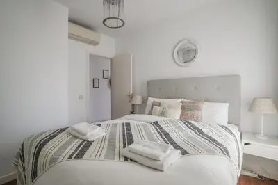 Cama o camas de una habitación en Bright and cozy-2Bedrooms 1Bathroom-Chueca