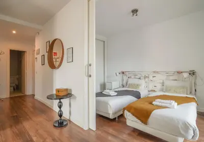 Cama o camas de una habitación en Bright and cozy-2Bedrooms 1Bathroom-Chueca